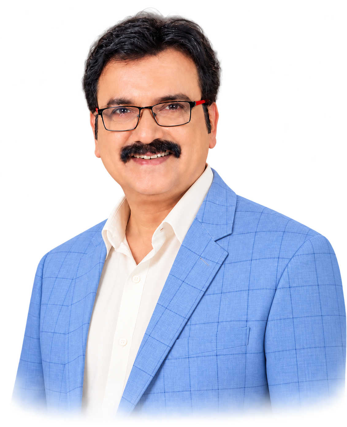 Actor Ramesh Donthula smiling in a blue checked suit